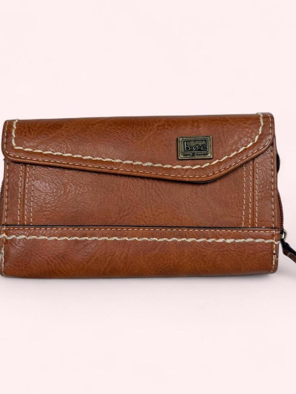 Brown wallet with white stitching